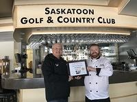 Food Safety 1st, Russell Scott presents Pat Mitchell the 12,000th Food Safety 1st certificate